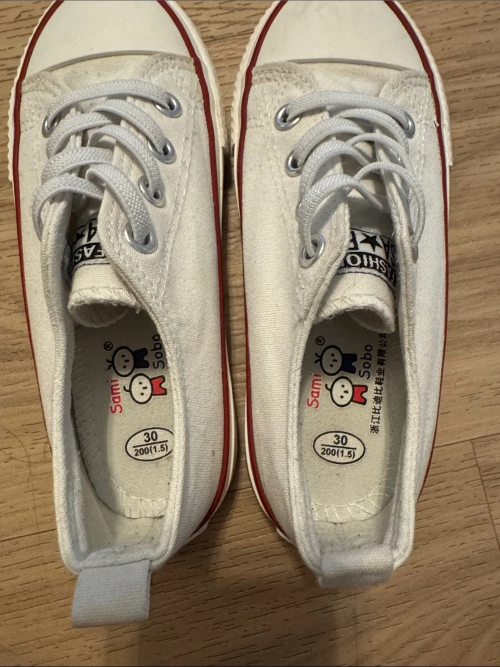 Skechers White Kids Sneakers with Red Stripe